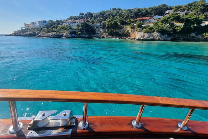 3 Island Cruise from Athens Unlimited Food Wine and Scenic Views - Stop 3, Moni Island Beach: the best swim slot, plus lunch and wildlife sightings