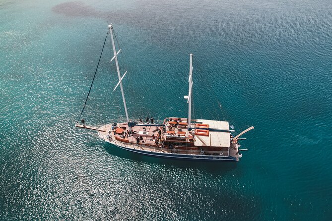 All Day Cruise -3 Islands to Agistri,Moni, Aegina with lunch and drinks included - Stop 3: the Moni beach swim setup and onboard lunch flow