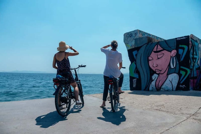 Athens: Electric Bike Seaside Tour with Guide - Getting to the coastline via Kerameikos and new cycle roads
