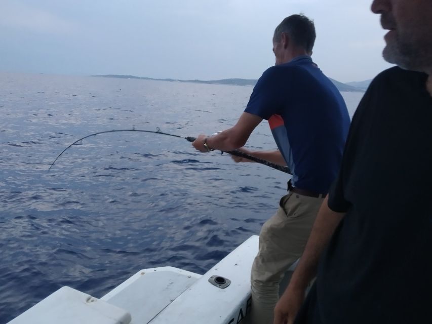 Athens: Fishing Trip Experience on a Boat with Seafood Meal - The stops that turn a fishing trip into a water day