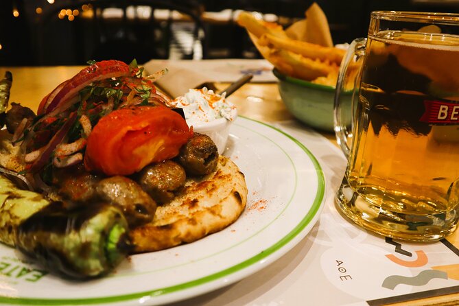 Athens Food Tasting Tour in Hidden Gems for Small Groups - Stop 3: Platia Avissinias moussaka with the classic béchamel layers