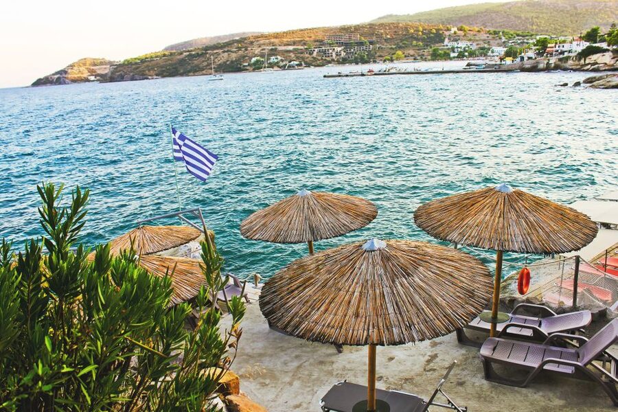 Athens: Guided Day Trip to Aegina Island with Swimming - Getting to the island: Piraeus meeting point and ticket handling