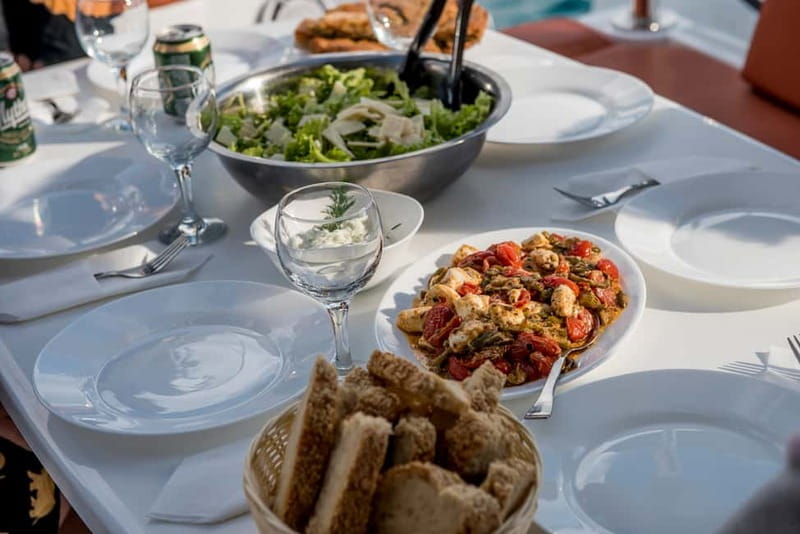 Athens: Half-Day Morning Catamaran Cruise with Meal & Drinks - Timing and Return: The One Quirk to Expect
