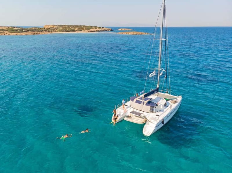 Athens: Half-Day Sunset Catamaran Cruise with Meal & Drinks - The catamaran experience: space, crew energy, and the onboard feel
