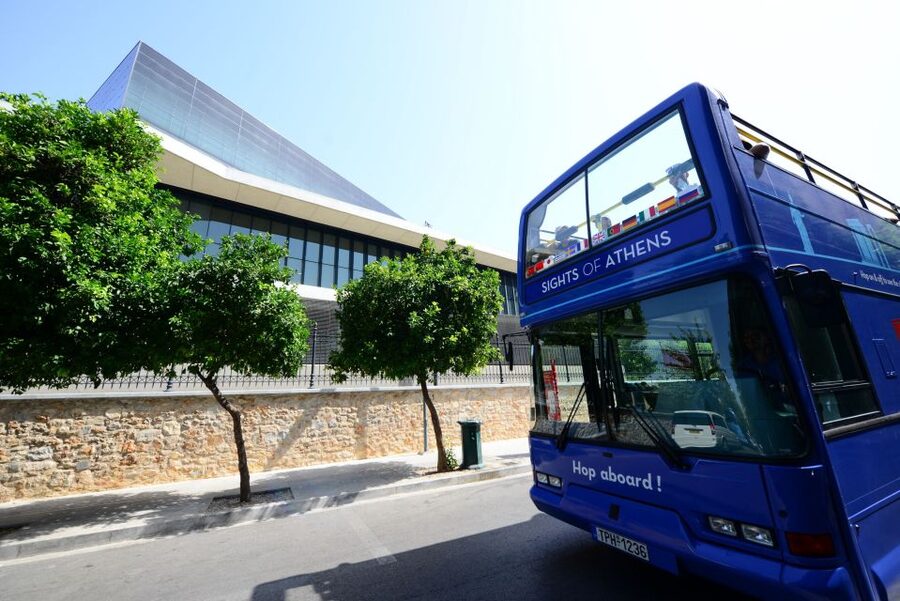 Athens, Piraeus, and Coastline: Blue Hop-On Hop-Off Bus - Yellow Line to Glyfada: Niarchos, marinas, sunset, and Agios Kosmas