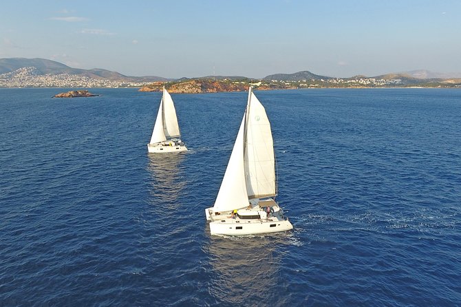 Athens Private Luxury Catamaran Cruise with Traditional Greek Meal and BBQ - Athens Riviera cruising, first drinks, and your first towel moment
