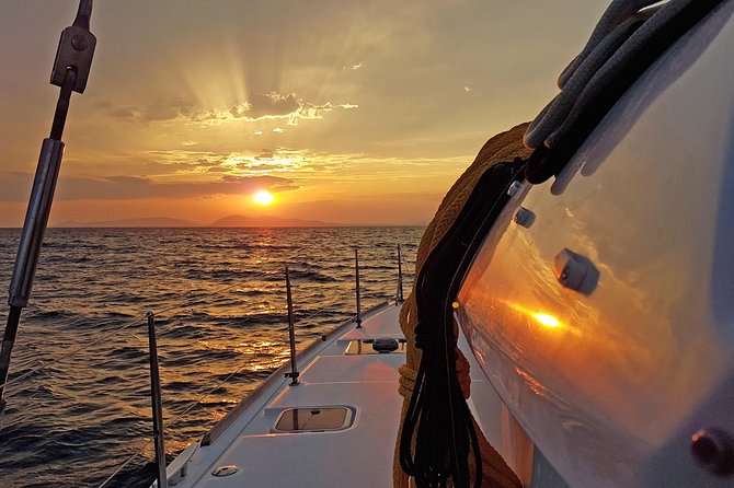 Athens Private Luxury Catamaran Cruise with Traditional Greek Meal and BBQ - The snorkeling and swimming stops, goggles in hand