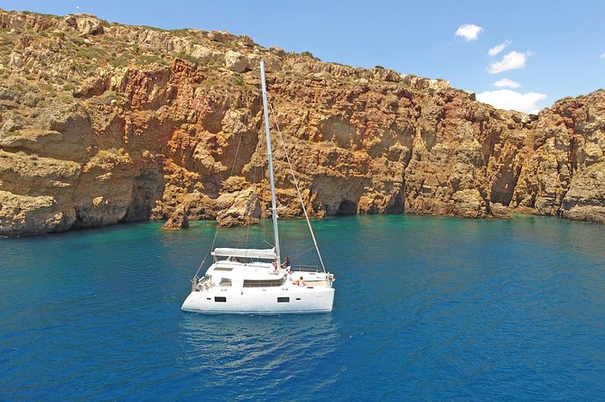Athens Private Luxury Catamaran Cruise with Traditional Greek Meal and BBQ - Getting picked up at your hotel and welcomed onboard