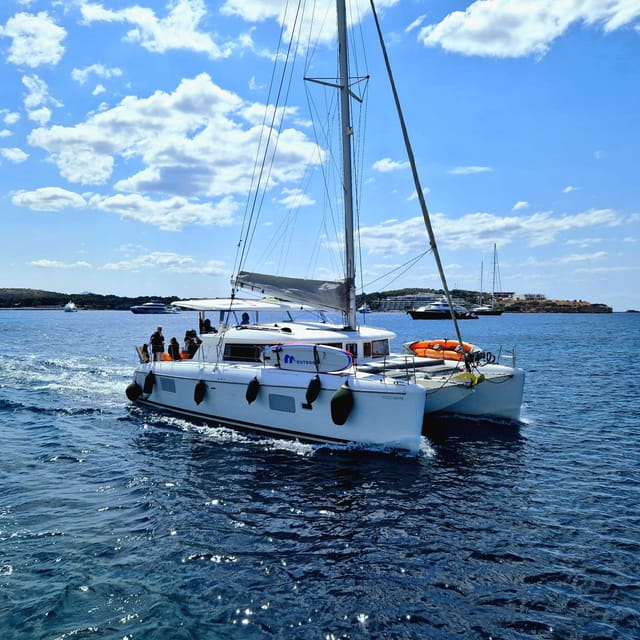Athens: Riviera Catamaran Tour with Fresh Meal and Drinks - Vouliagmeni and Asteras Bay: the calm-water swim stop