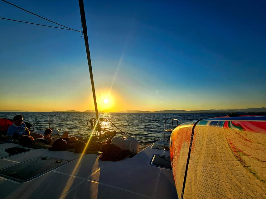 Athens: Riviera Catamaran Tour with Fresh Meal and Drinks - Lunch onboard: how a 7-dish meal changes the day