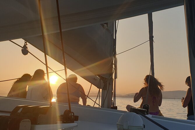 Athens Riviera Private Sail Catamaran with Meal and Wine - Vouliagmeni Bay stop: swim time with big-coast views