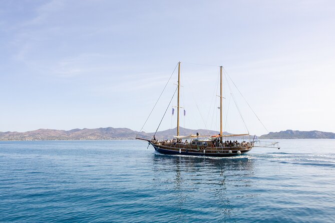 Athens Sunset Dinner Cruise – Swim Stop, Dinner & Open Bar - Dinner on Board: Greek Buffet, Dietary Options, and Real Atmosphere