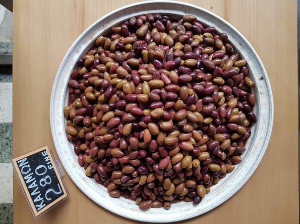 Athens: The Classic Food Tasting Tour - Cretan flavor round: cheese, olives, rusks, olive oil, plus raki culture