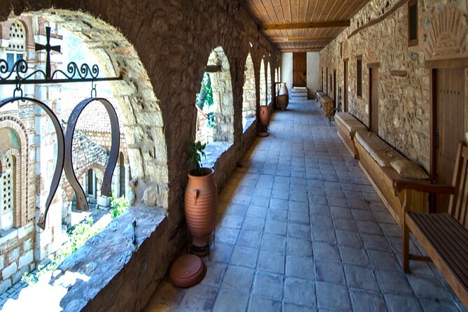 Delphi & Hosios Loukas Monastery Full Day Tour From Athens - Temple of Apollo: the Doric temple and the omphalos legend