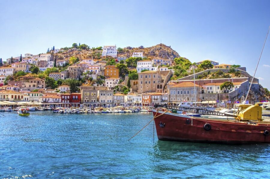 From Athens: Saronic Islands Full-Day Cruise with VIP Seats - Poros in 50 Minutes: Pine Trees, White Lanes, and a Clock Tower Stop