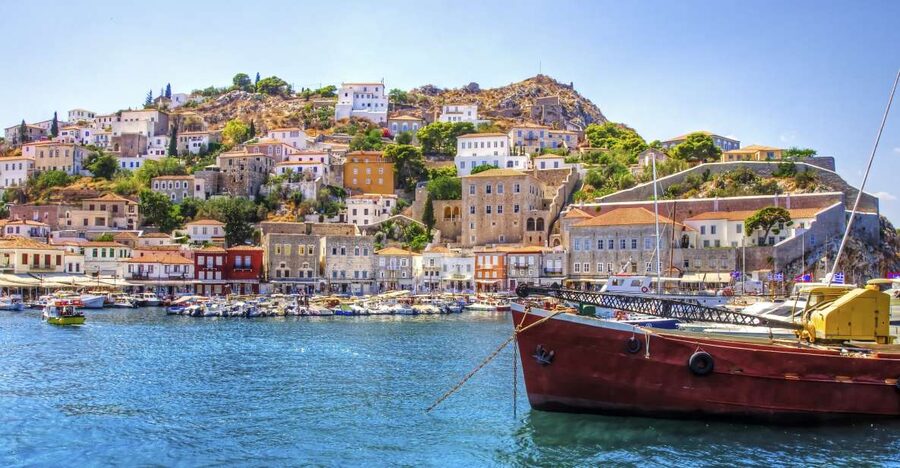 From Athens: Saronic Islands Full-Day Cruise with VIP Seats - From Athens to Hydra: Fast Boarding, Welcome Drinks, and Pirate-Era Drama