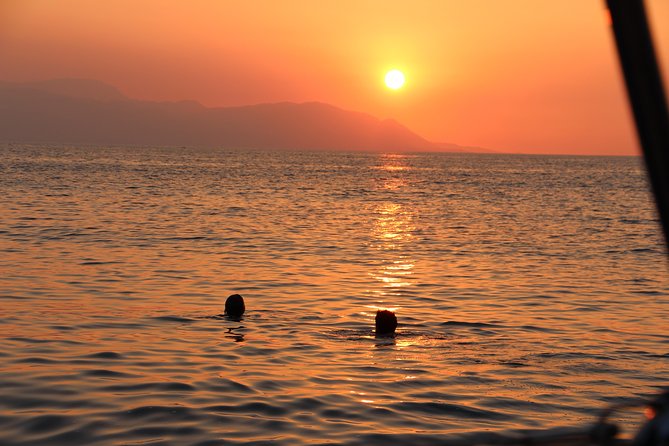 Full day cruise Aigina|Moni|Agkistri with traditional Greek feast - Moni beach time: swim, snorkel, and SUP in clear water