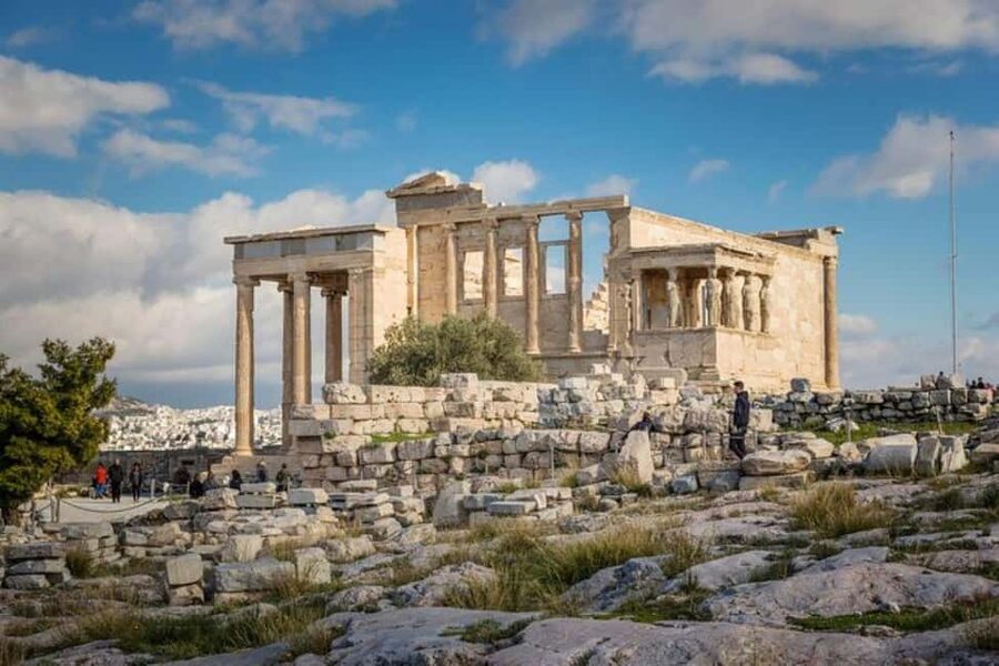 Guided walking tour of Acropolis with bus city tour - Acropolis Walk: Propylaea, Temple of Nike, and the Parthenon