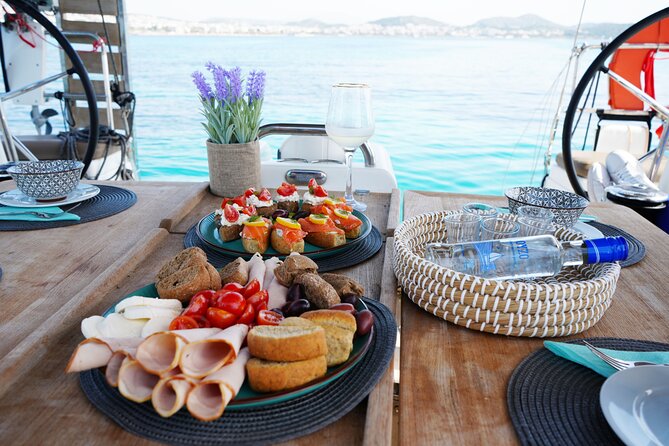 Luxury Catamaran Full Day Private & Greek Gastronomy in Athens - Swimming Spots, Snorkeling Gear, and SUP Onboard