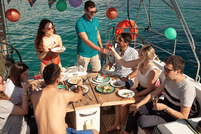 Luxury Catamaran Morning Semi-Private & Greek Gastronomy Athens - Hydrousa Island at 10:15: swimming time, sandy ease, and a Greek meal waiting