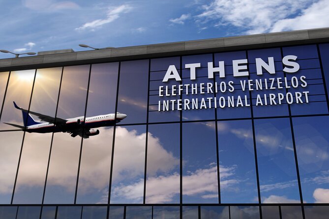 Private Transfer from Athens Airport to Athens City Center Hotels - The arrivals hall setup: sign, luggage help, and flight tracking