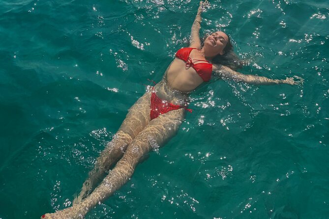 Sunset Cruise Athens Riviera – Half Day Swimming&BBQ onBoard - Stop 2: Hydrousa Islet for snorkeling, caves, and quiet nature