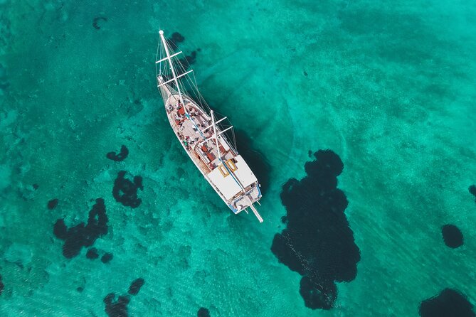 Sunset Dinner Cruise: Sunset, Swim, Drinks, and Dinner Onboard - Stop by stop: Athens, Ydrousa, and the Vouliagmeni area