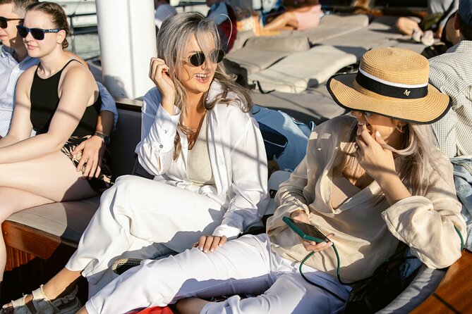 Sunset Dinner Cruise: Sunset, Swim, Drinks, and Dinner Onboard - Onboard dinner: fresh-cooked food plus beer, wine, and soft drinks