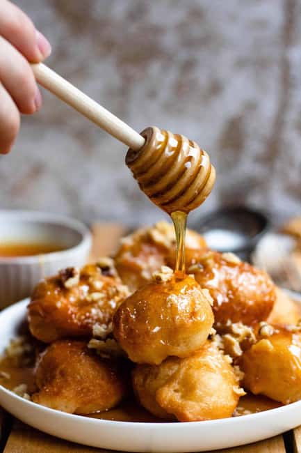 Taste Authentic Greek Flavors – Food Tour in Athens - Loukoumades to finish, honey and cinnamon that make you slow down